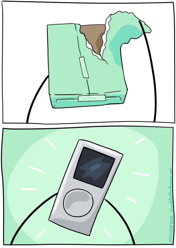 Unwrapping a present with green wrapping paper ... and ... it's a silver ipod